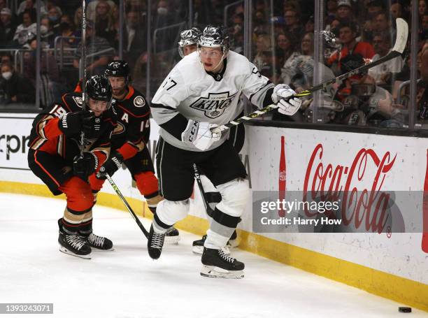 Jacob Moverare of the Los Angeles Kings skates after the puck along the boards with ad19during the first period at Crypto.com Arena on April 23, 2022...