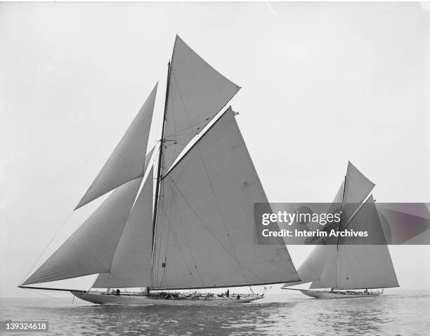 View of the racing yachts Constitution and Columbia, probably during trials for America's Cup, 1901.