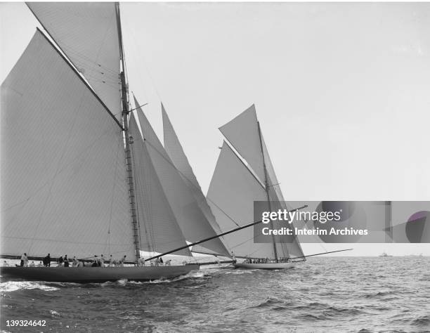 View of Sir Thomas Lipton's Shamrock I and JP Morgan's yacht Columbia, after the start of the America's Cup race, October 7, 1899.