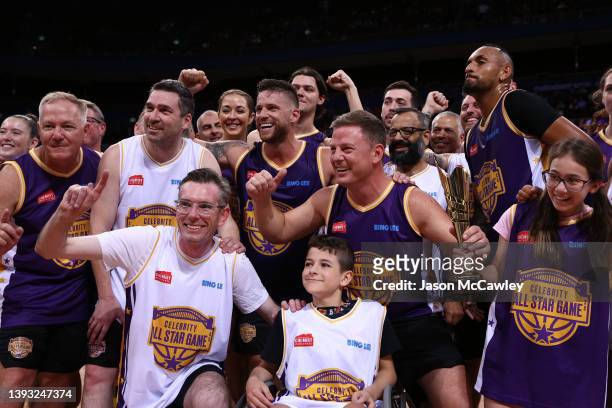 Dominic Perrottet NSW Premier and Ben Fordham poses for a team after the Sydney Kings Starlight Celebrity Game at Qudos Bank Arena on April 24, 2022...