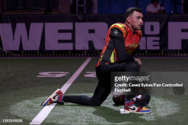 Johnny Manziel of Zappers kneels before the game against the Glacier Boyz during Fan Controlled Football Season v2.0 - Week Two on April 23, 2022 in...