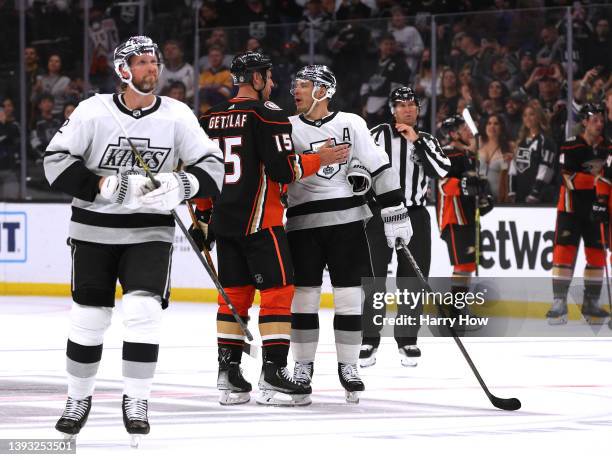 Ryan Getzlaf of the Anaheim Ducks, who will retire at the end of the season, shakes hands at center ice with Dustin Brown of the Los Angeles Kings...