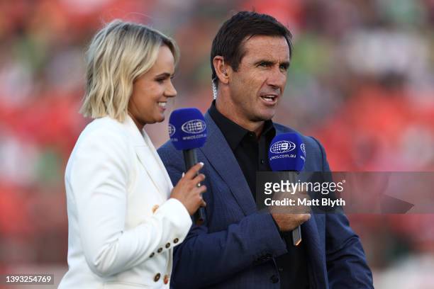 Channel Nine commentator and former player Andrew Johns and Emma Lawrence are seen before the round seven NRL match between the Penrith Panthers and...