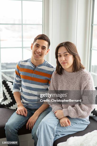teenager sibling portrait at home - brother sister stock pictures, royalty-free photos & images