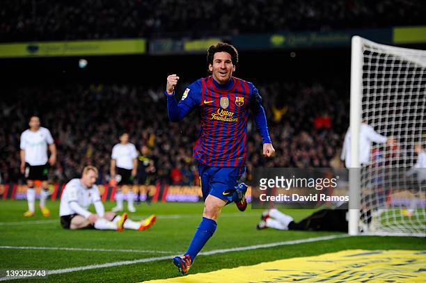 Lionel Messi of FC Barcelona celebrates after scoring his team's second goal during the La Liga match between FC Barcelona and Valencia CF at Camp...