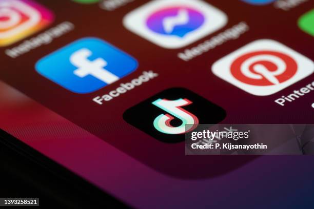 social media application tiktok on the smartphone screen - social media marketing stock pictures, royalty-free photos & images