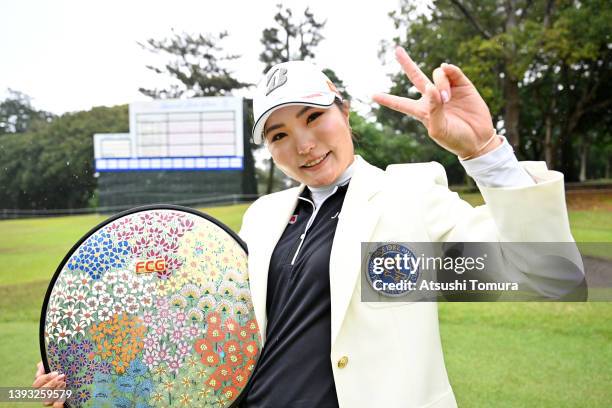 Sayaka Takahashi of Japan poses with the trophy after winning the tournament following the final round of Fuji Sankei Ladies Classic at Kawana Hotel...