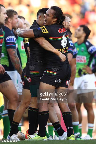 Jarome Luai of the Panthers celebrates with Soni Luke of the Panthers after the try scored by Isaah Yeo of the Panthers during the round seven NRL...