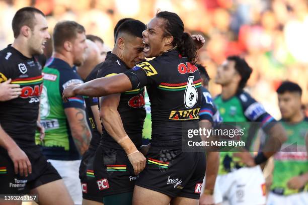 Jarome Luai of the Panthers celebrates with Soni Luke of the Panthers after the try scored by Isaah Yeo of the Panthers during the round seven NRL...