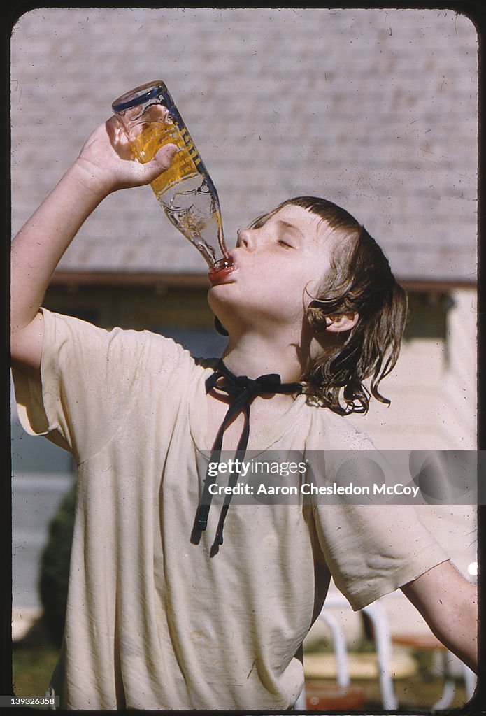 Girl drinking from bottle