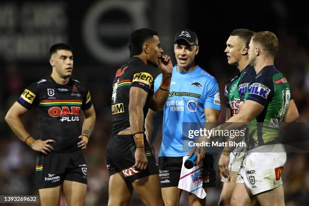 Stephen Crichton of the Panthers and Jack Wighton of the Raiders have words following the round seven NRL match between the Penrith Panthers and the...