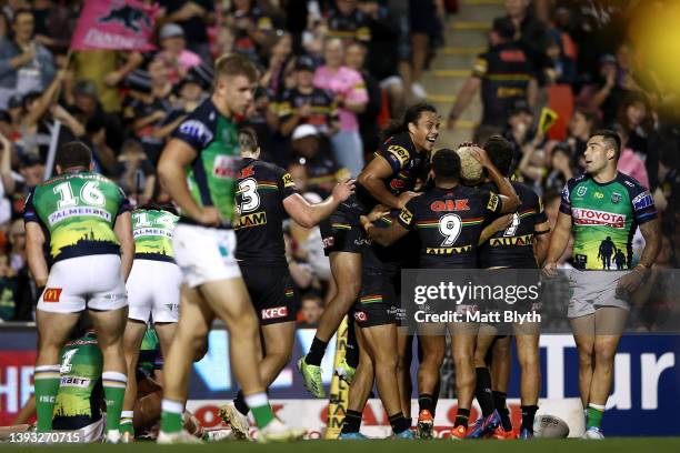 Viliame Kikau of the Panthers celebrates with team mates after scoring a try during the round seven NRL match between the Penrith Panthers and the...