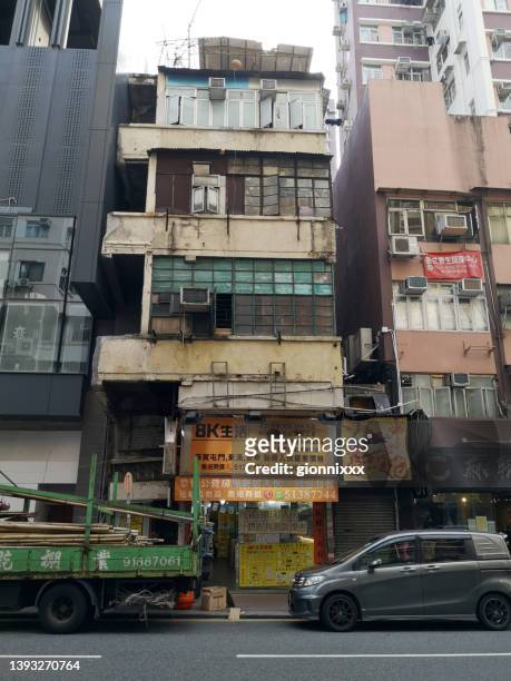 old building architecture in cheung sha wan, hong kong - hong kong residential building stock pictures, royalty-free photos & images