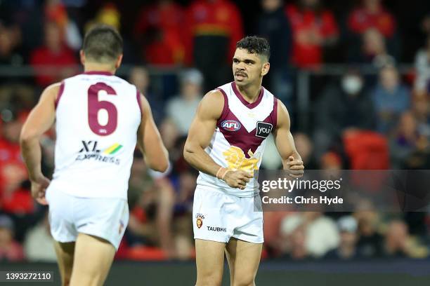 Charlie Cameron of the Lions celebrates a goal during the round six AFL match between the Gold Coast Suns and the Brisbane Lions at Metricon Stadium...