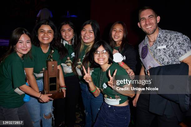 Mark Keppel High School students, Jelina Hendrickson, Amber Cardenas, Gabby Wong, Justine Lee, Alexa Armendariz, Tiffany To with poet Brian...