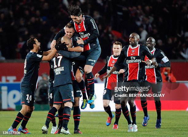 Paris Saint-Germain's Alex Rodrigo Dias Da Costa celebrates with teammates after scoring a goal during the French L1 football match PSG vs...