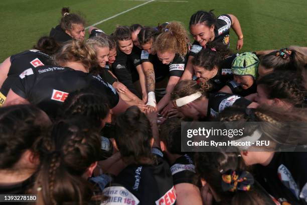 Players of Exeter Chiefs Women huddle as they celebrate winning the Allianz Cup after victory in the Allianz Cup Final between Exeter Chiefs Women...