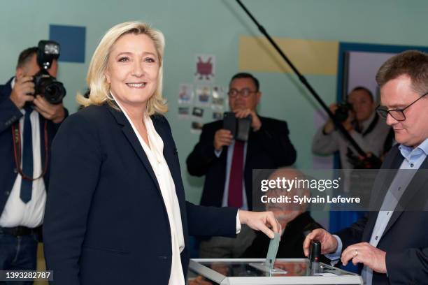 French far-right National Rally candidate Marine Le Pen casts her ballot for the 2nd round of the presidential election on April 24, 2022 in...