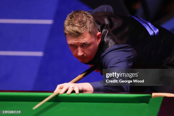 Kyren Wilson of England plays a shot during the Betfred World Snooker Championship Round Two match between Kyren Wilson of England and Stuart Bingham...