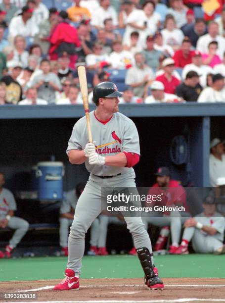 Mark McGwire of the St. Louis Cardinals bats against the Pittsburgh Pirates during a Major League Baseball game at Three Rivers Stadium in 1998 in...