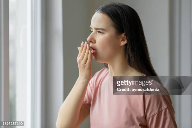 woman sick and having cough - bad breath stock pictures, royalty-free photos & images