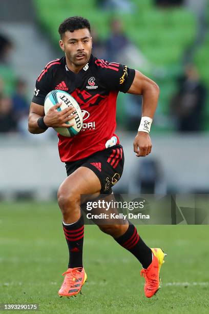 Richie Mo'unga of the Crusaders runs with the ball during the round 10 Super Rugby Pacific match between the Crusaders and the Melbourne Rebels at...