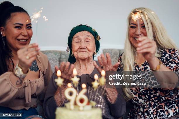 celebrating 96 years old grandma's birthday - 90 birthday stock pictures, royalty-free photos & images