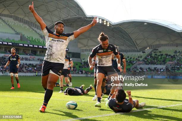 Ricky Jackson of the Crusaders and Andy Muirhead of the Brumbies celebrate the try of Noah Lolesio of the Brumbies during the round 10 Super Rugby...