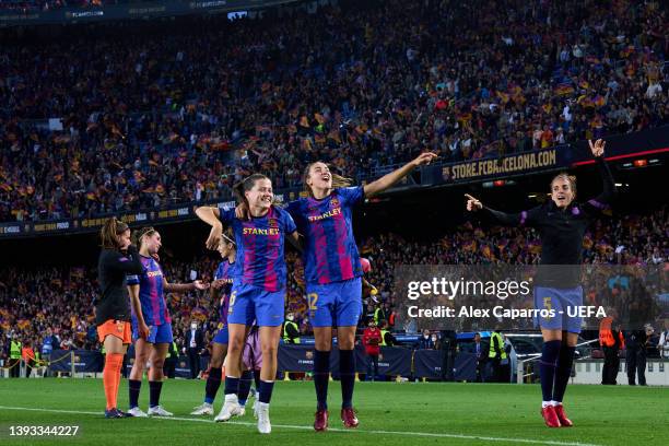 Claudia Pina, Patri Guijarro and Melanie Serrano of FC Barcelona celebrate victory following the UEFA Women's Champions League Semi Final First Leg...