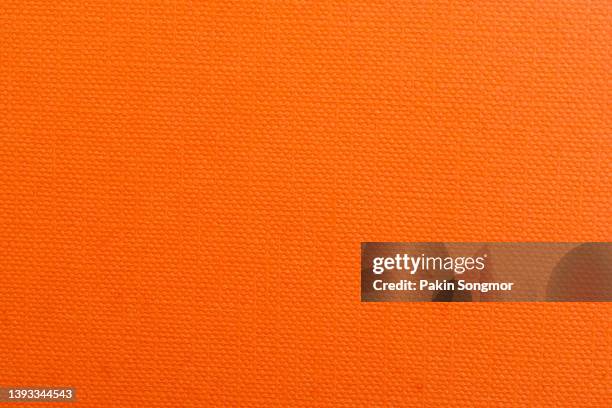 orange color paper sheet texture cardboard background. - oranje achtergrond stockfoto's en -beelden