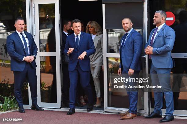 Emmanuel Macron and Brigitte Macron leave the voting poll on April 24, 2022 in Le Touquet-Paris-Plage, France. Emmanuel Macron and Marine Le Pen were...