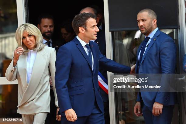 Emmanuel Macron and Brigitte Macron leave the voting poll on April 24, 2022 in Le Touquet-Paris-Plage, France. Emmanuel Macron and Marine Le Pen were...