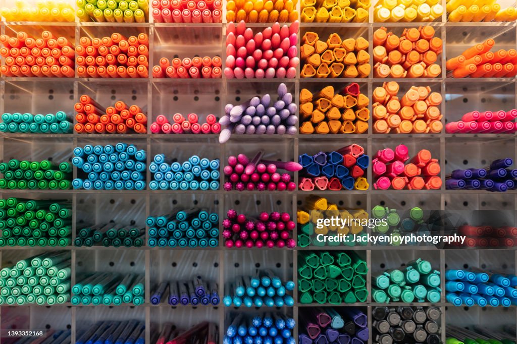 Colorful pens on the shelf