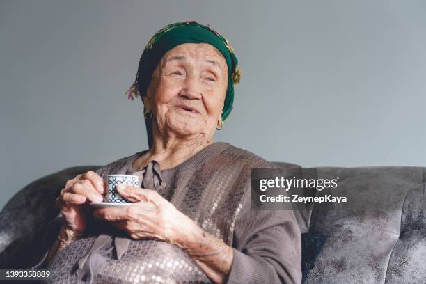 96 years old senior woman drinking turkish coffee - van turkiet bildbanksfoton och bilder