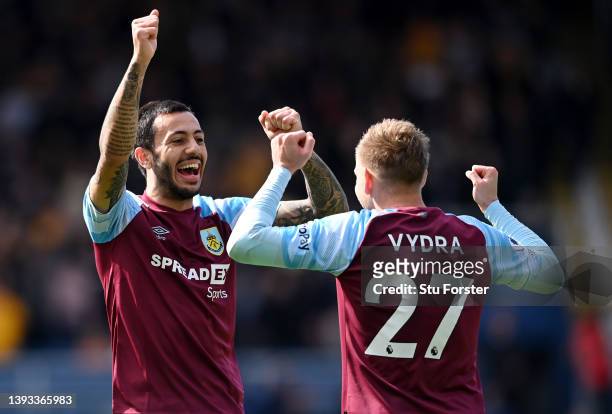 Matej Vydra celebrates with teammate Dwight McNeil of Burnley after scoring their team's first goal during the Premier League match between Burnley...