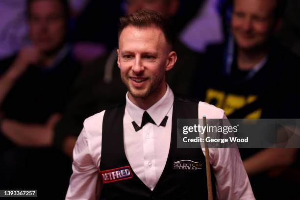 Judd Trump of England reacts during the Betfred World Snooker Championship Round Two match between Judd Trump of England and Anthony McGill of...