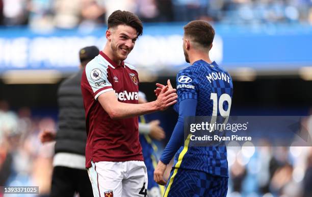 Declan Rice of West Ham United embraces Mason Mount of Chelsea after the Premier League match between Chelsea and West Ham United at Stamford Bridge...