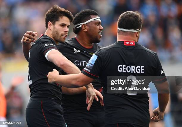 Sean Maitland of Saracens celebrates scoring his sides second try with Jamie George and teammates during the Gallagher Premiership Rugby match...