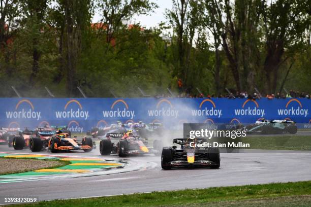 Max Verstappen of the Netherlands driving the Oracle Red Bull Racing RB18 leads the field at the start during the F1 Grand Prix of Emilia Romagna at...