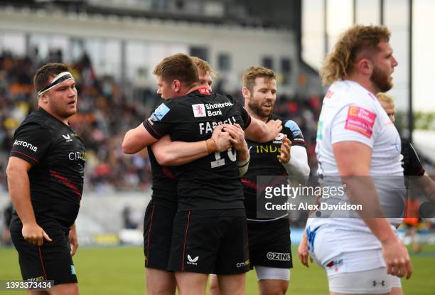 Nick Tompkins of Saracens celebrates scoring their sides third try with Owen Farrell during the Gallagher Premiership Rugby match between Saracens...