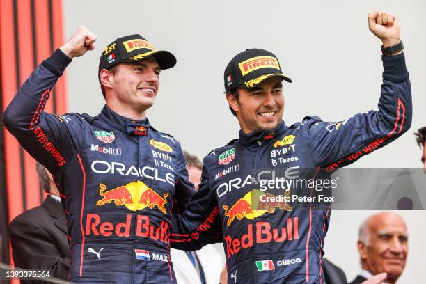 Max Verstappen of Red Bull Racing and The Netherlands celebrates with Sergio Perez of Mexico and Red Bull Racing after finishing in first and second...