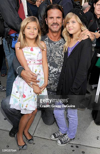 Lorenzo Lamas, daughters Isabella Lamas and Victoria Lamas arrive at the Grand Opening of Famous Cupcakes on October 7, 2009 in Beverly Hills,...