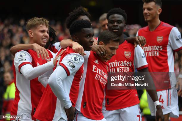 Eddie Nketiah of Arsenal celebrates with team mates but the goal is disallowed during the Premier League match between Arsenal and Manchester United...