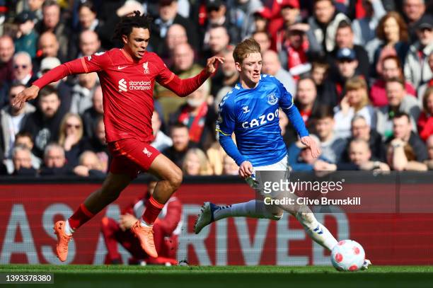 Anthony Gordon of Everton is challenged by Trent Alexander-Arnold of Liverpool during the Premier League match between Liverpool and Everton at...