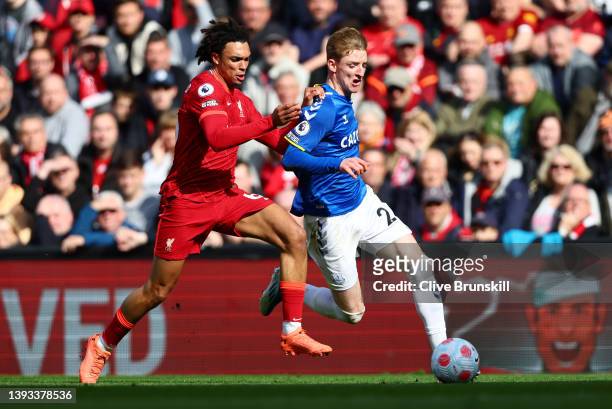 Anthony Gordon of Everton is challenged by Trent Alexander-Arnold of Liverpool during the Premier League match between Liverpool and Everton at...