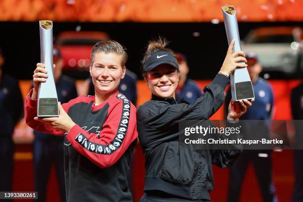 Demi Schuurs of Netherlands and Desirae Krawczyk of United States of America pose for a photo during trophy ceremony after they win their final match...