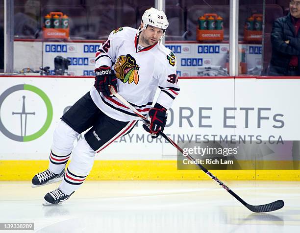 John Scott of the Chicago Blackhawks skates during the team warmup prior to NHL action on January 31, 2012 against the Vancouver Canucks at Rogers...