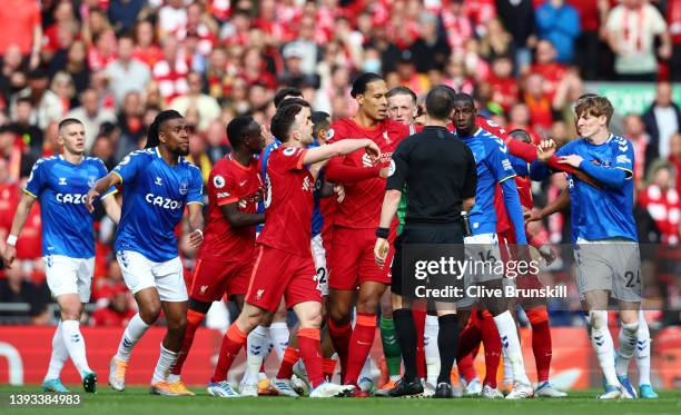 Liverpool and Everton players clash during the Premier League match between Liverpool and Everton at Anfield on April 24, 2022 in Liverpool, England.