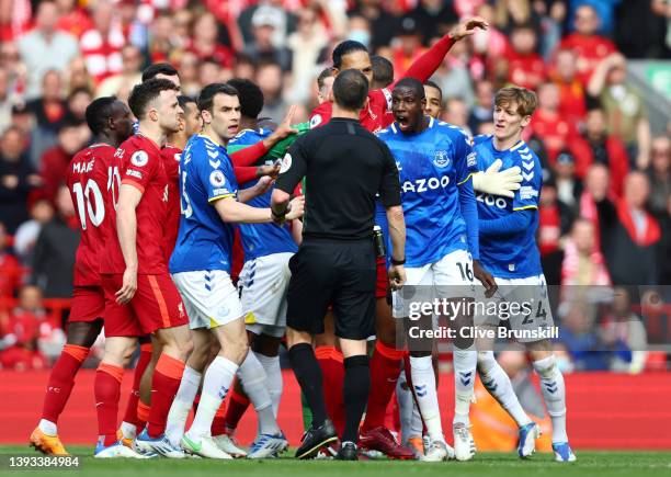 Liverpool and Everton players clash during the Premier League match between Liverpool and Everton at Anfield on April 24, 2022 in Liverpool, England.