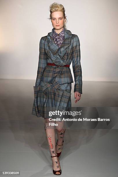 Model walks the runway during the Vivienne Westwood Autumn/Winter 2012 show at London Fashion Week at Goldsmiths' Hall on February 19, 2012 in...